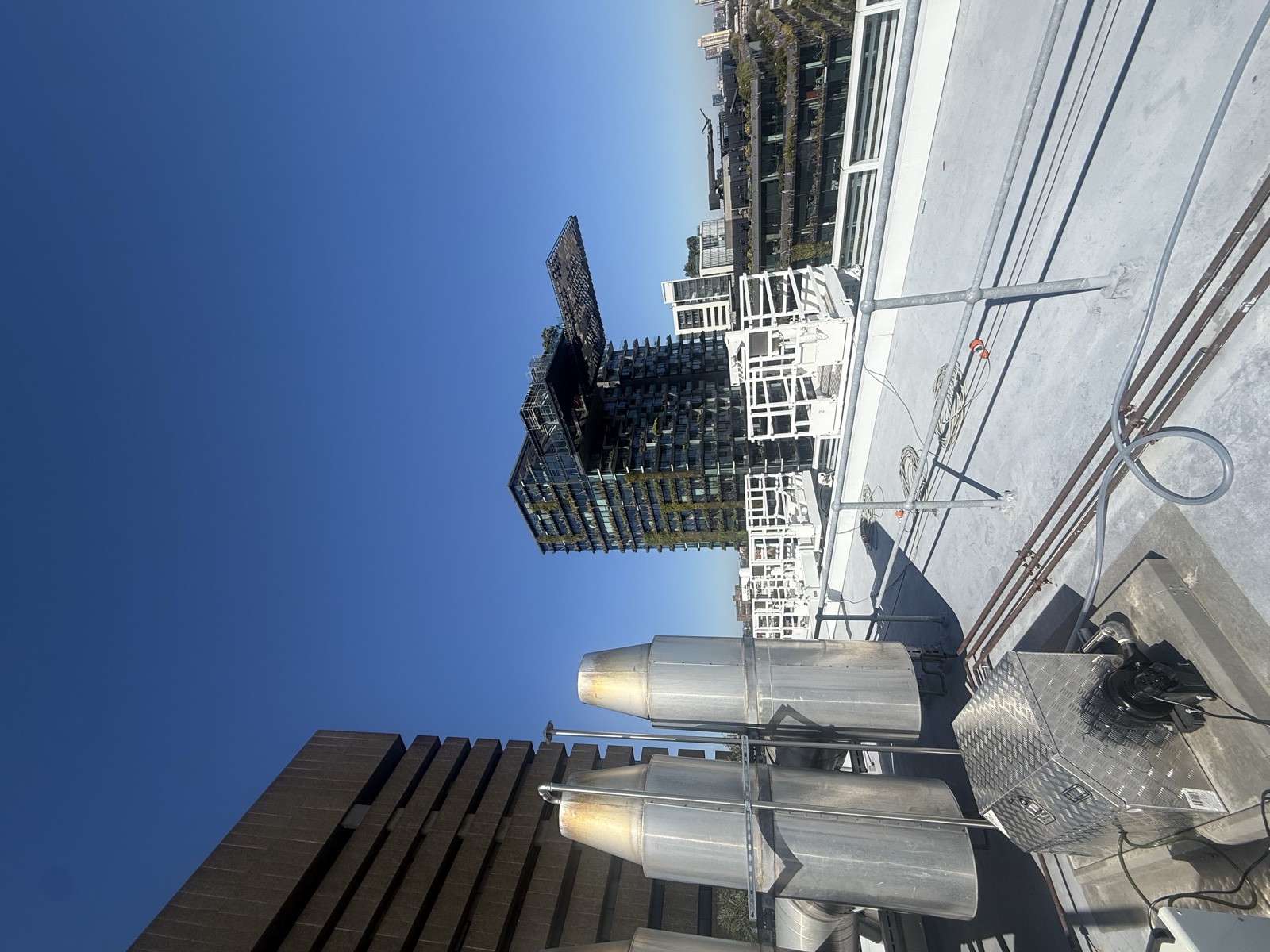 Air2Energy's field prototype on a UTS rooftop, with the Sydney skyline behind